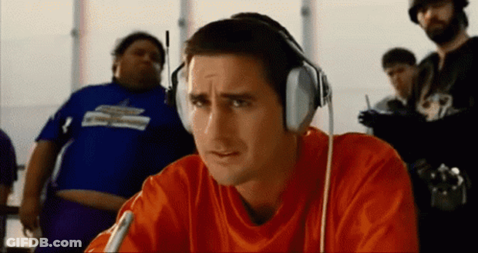 Idiocracy Luke Wilson Wearing Headset While Seating GIF