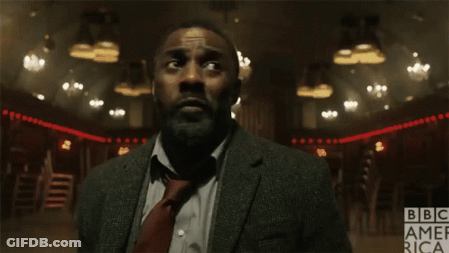Idris Elba Pointed By A Gun GIF