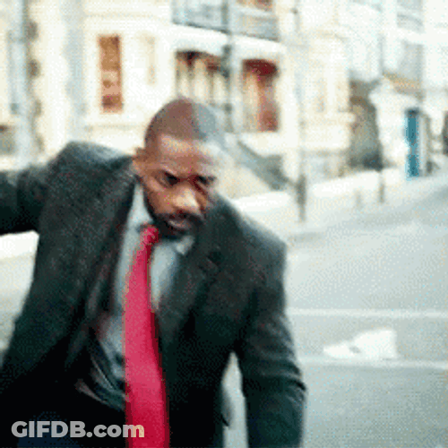 Idris Elba Snicking Around GIF