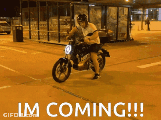 Im Coming Riding Motorcycle GIF