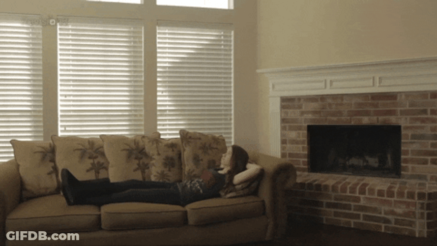 Im Waiting Lying In Couch Bored GIF