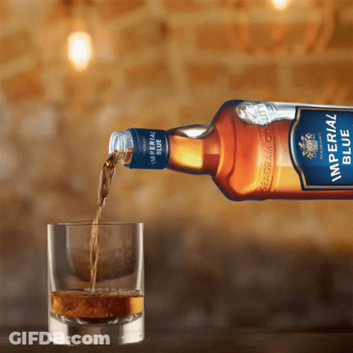 Imperial Blue Seagram Whisky Poured Into Glass GIF