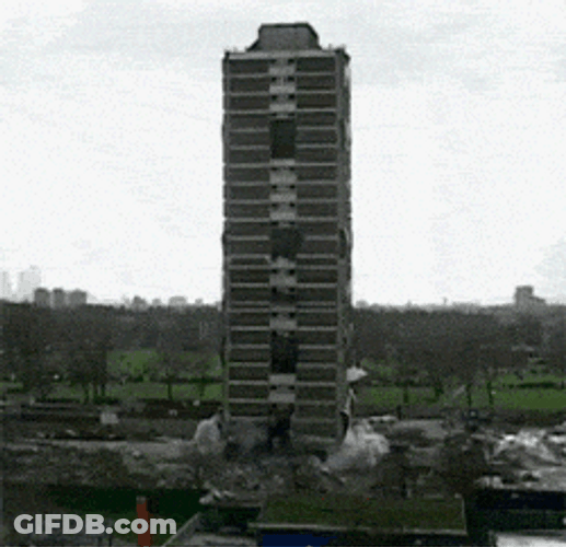 Implosion Of Building Like Jenga Game GIF