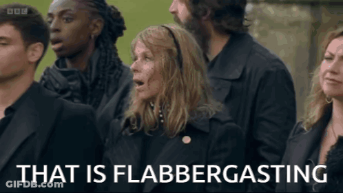 Indian Flag Waving In Wind Against Blue Sky With Clouds GIF