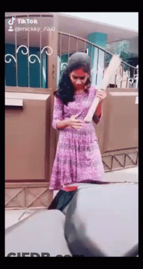 Indian Girl Holding Broom GIF