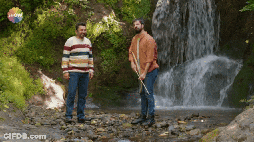 Indian Guys Shooting Archery Target GIF