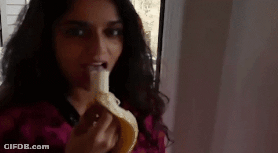 Indian Woman Eating Banana GIF
