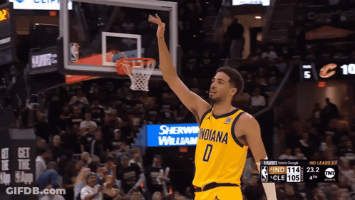 Indiana Pacers Player Holding Go Pacers Sign GIF
