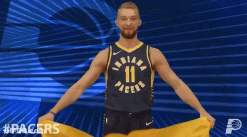 Indiana Pacers Player Holding Yellow Flag GIF