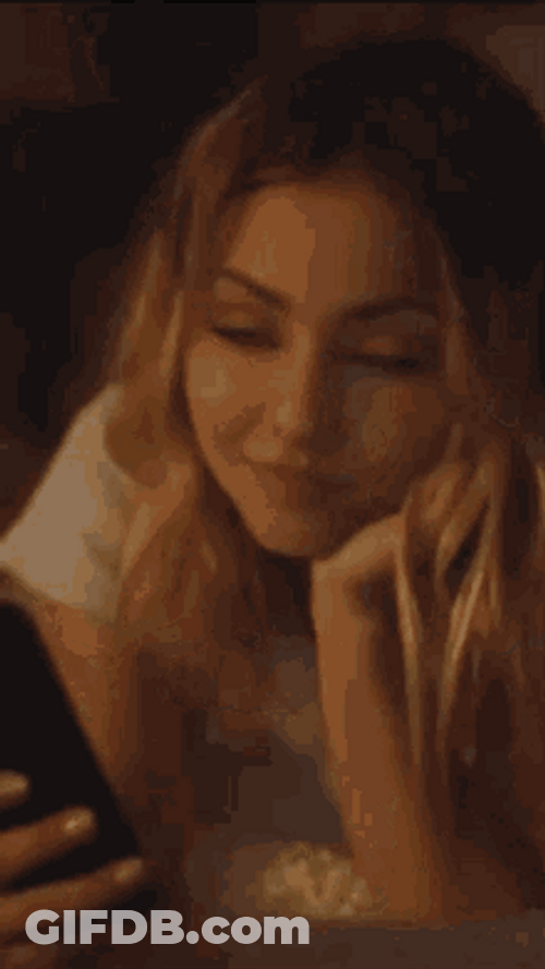 Infatuated Girl Like Her Phone Pal GIF