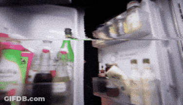 Inside Refrigerator With Soda Bottles And Box Marked A GIF
