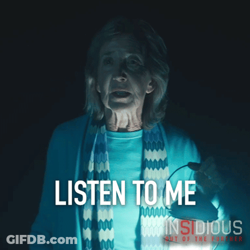 Insidious Out Of The Further Poster Woman Holding Lantern GIF