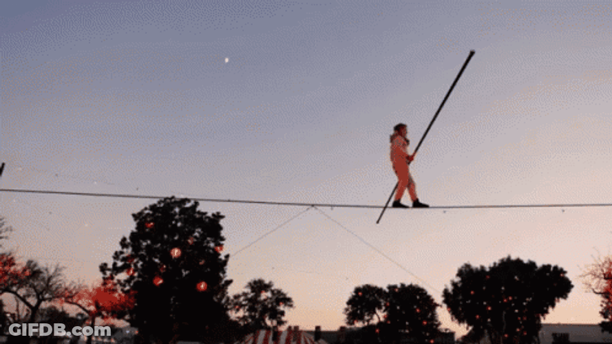 Intense Circus Wire Crossing Stunt GIF