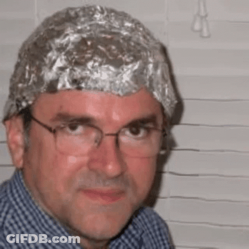 Intense Gaze Tinfoil Hat Meme GIF