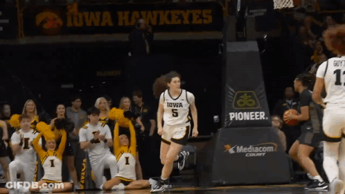 Iowa Hawkeyes Playing Basketball In Front Of Crowd GIF