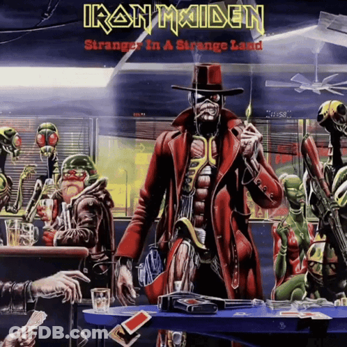 Iron Maiden Strange In A Strange Land Shows A Man In A Top Hat GIF