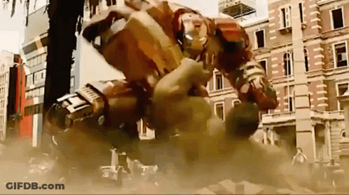 Iron Man And Hulk Fighting In City GIF
