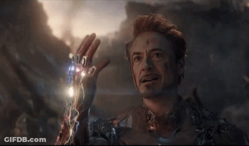Iron Man Is Holding The Infinity Gauntlet In His Hand In The Endgame . GIF