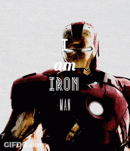 Iron Man Standing In Front Of City At Night GIF