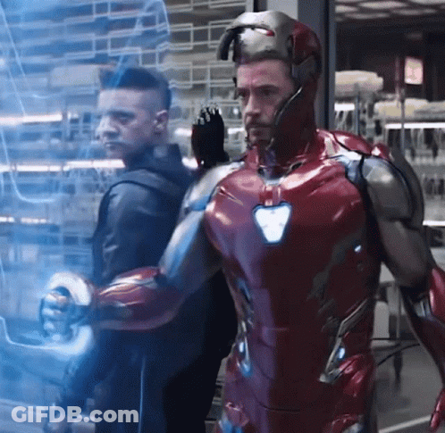 Iron Man Suit Man Next To Black Jacket Man GIF