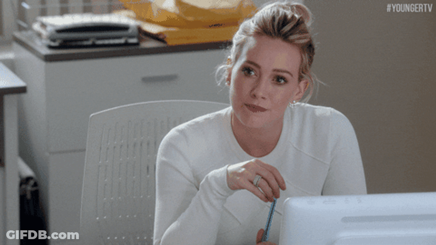 Irritated Hilary Duff Shakes Head GIF