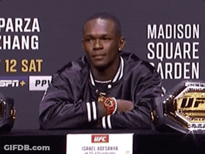 Israel Adesanya Shaking His Fingers GIF