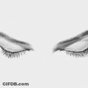 It Is A Black And White Drawing Of A Woman 'S Eyes And Eyebrows . GIF