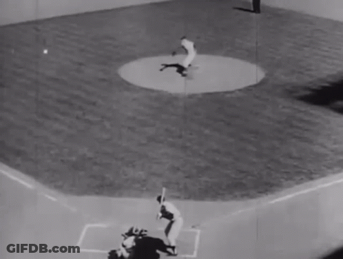 It Is A Black And White Photo Of A Baseball Game . GIF