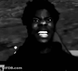 It Is A Black And White Photo Of A Man With His Mouth Open . GIF
