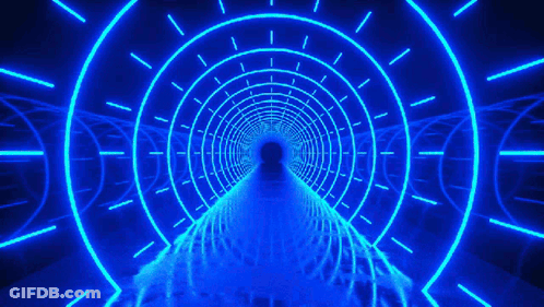 It Looks Like A Tunnel With A Clock On The Wall . GIF