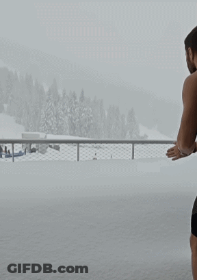 It's Coming Poster With Snow Falling GIF
