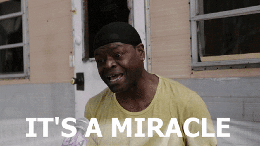 Its A Miracle Man Stretching His Arms GIF