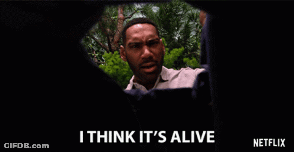 Its Alive Anthony Alabi Peeking In Hole GIF