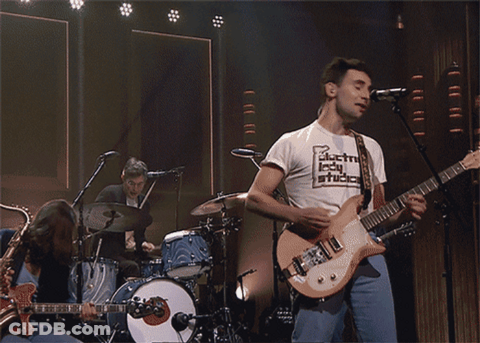 Jack Antonoff Playing Lead Guitar On Stage GIF