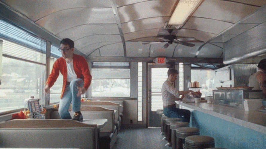Jack Antonoff Singing In A Restaurant GIF