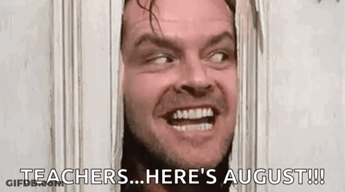 Jack Nicholson From The Shining Is Smiling While Looking Through A Doorway . GIF