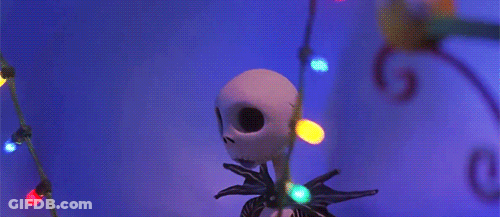 Jack Skellington From The Nightmare Before Christmas Has A String Of Christmas Lights Around His Neck GIF