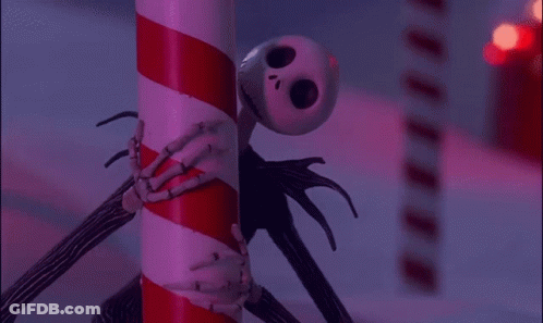Jack Skellington Leaning Against Candy Cane GIF