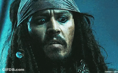 Jack Sparrow From Pirates Of The Caribbean Has A Beard And A Bandana Around His Head GIF