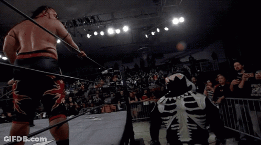 Jacob Fatu Doing Back Flip Out Of Ring GIF