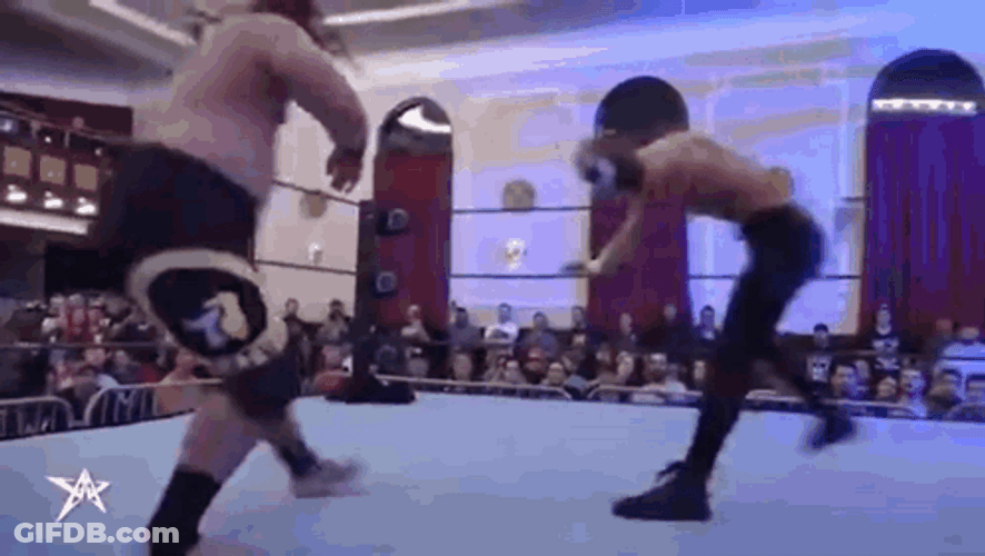 Jacob Fatu Making Opponent Fall With Kick GIF