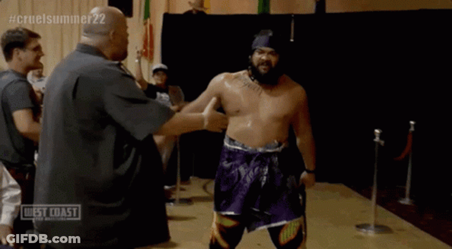 Jacob Fatu Placing Wrestling Belt On Shoulder GIF