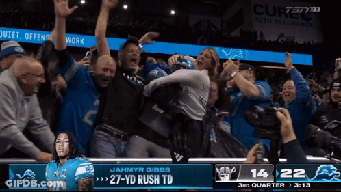 Jahmyr Gibbs 27 Yd Rush TD Celebrated By Fans GIF