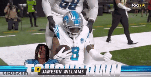 Jameson Williams Holding Football GIF