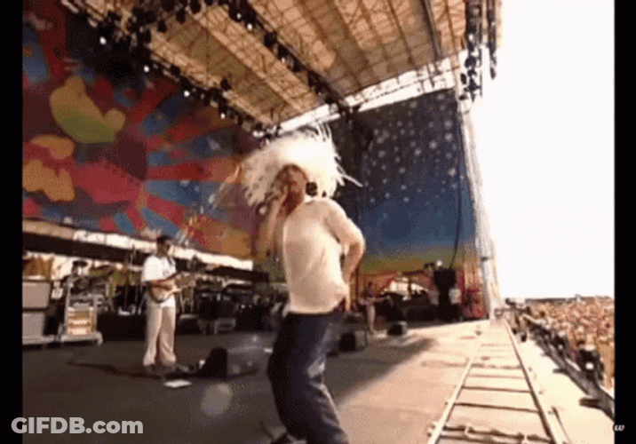 Jamiroquai Jay Kay Doing Thug Shaker On Stage GIF