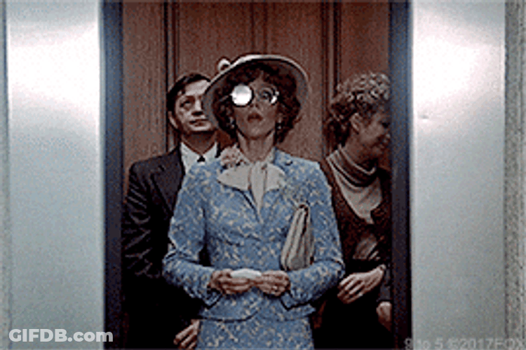 Jane Fonda Stopping Elevator Door From Closing GIF