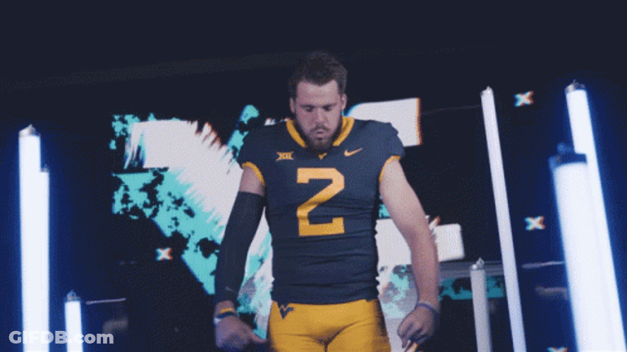 Jarret Doege Mountaineers Player Flexing And Posing GIF