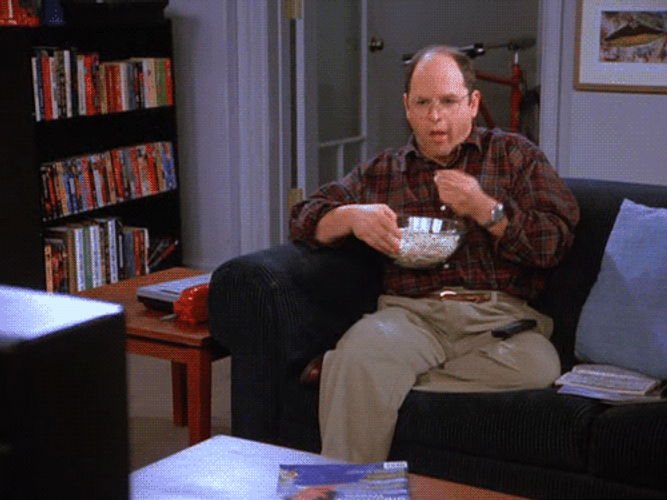 Jason Alexander Eating Popcorn Calmly Meme GIF