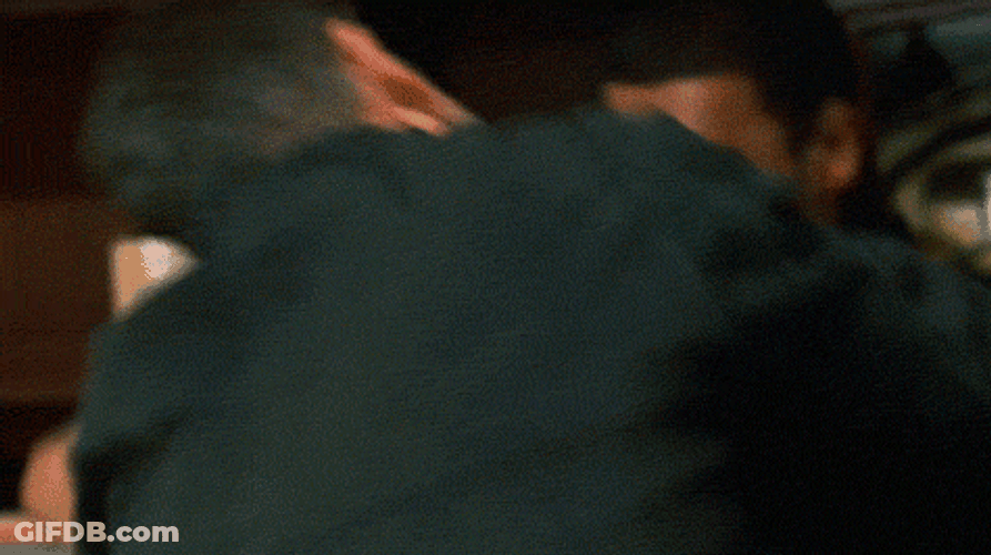 Jason Bourne Holding A Book While Attacking GIF
