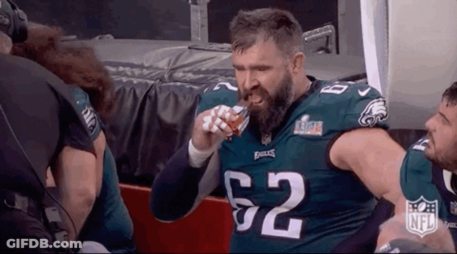 Jason Kelce Eating Energy Bar GIF